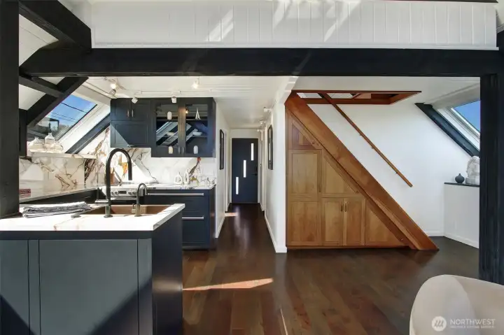 The remodeled kitchen is thoughtfully designed with extra storage every where you look.