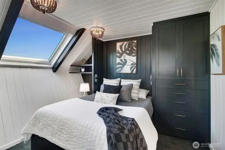 It might appear this is a Murphy bed but it is not.  This is a Queen Size bed on a platform with the storage underneath.
