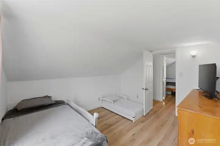 Additional upstairs bedroom — Flexible upper-level space perfect for kids, guests, or hobbies.