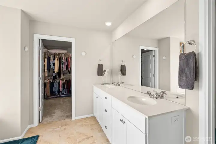 Lower level space is complete with shower and dual vanity bath.