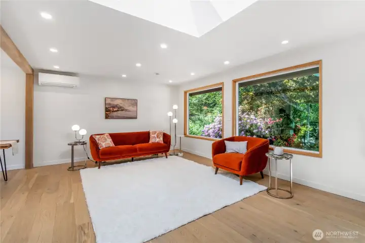Living room with windows facing west