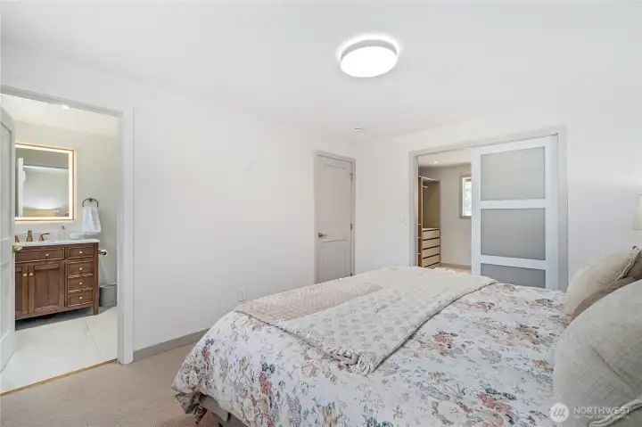 Primary bedroom with ensuite bathroom