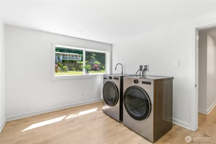 New washer and dryer in separate laundry room