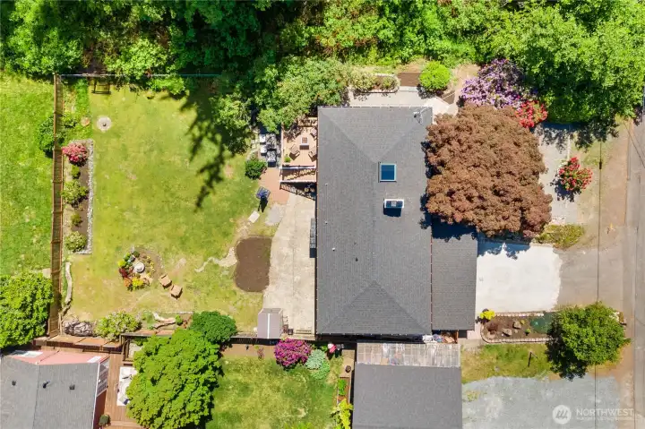 Aerial view of home with roof