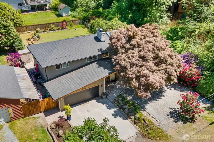 Aerial view home and driveway, yard