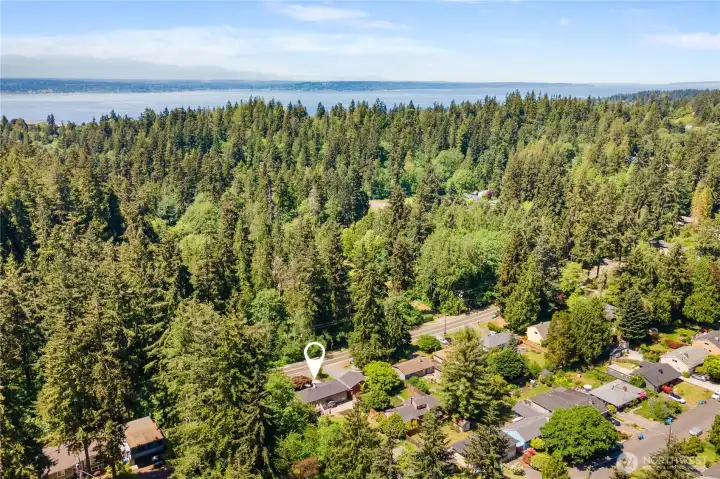 Private lot faces green woodland trails of Boeing Park