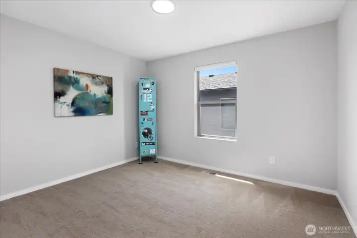 1st of three upstairs bedrooms.