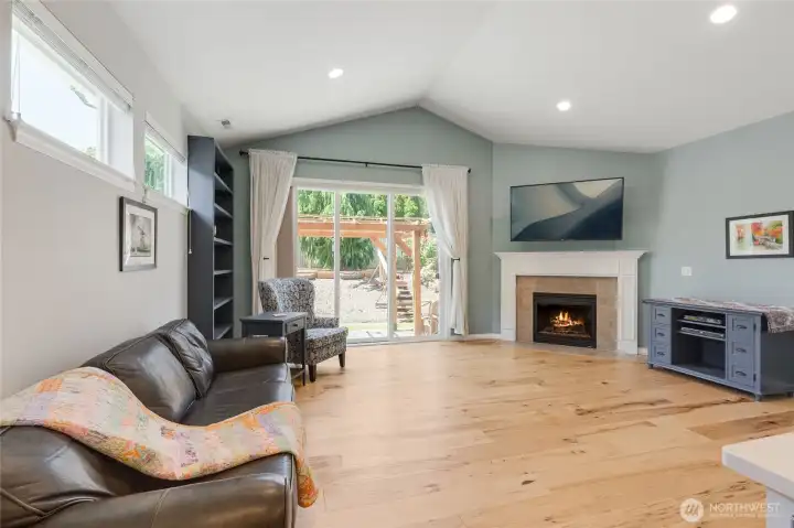 The kitchen blends perfectly with the family room to create the great room concept that is so desired on the market today.  The seller had the hardwood floors extended into this space creating a uniform look that feels large!