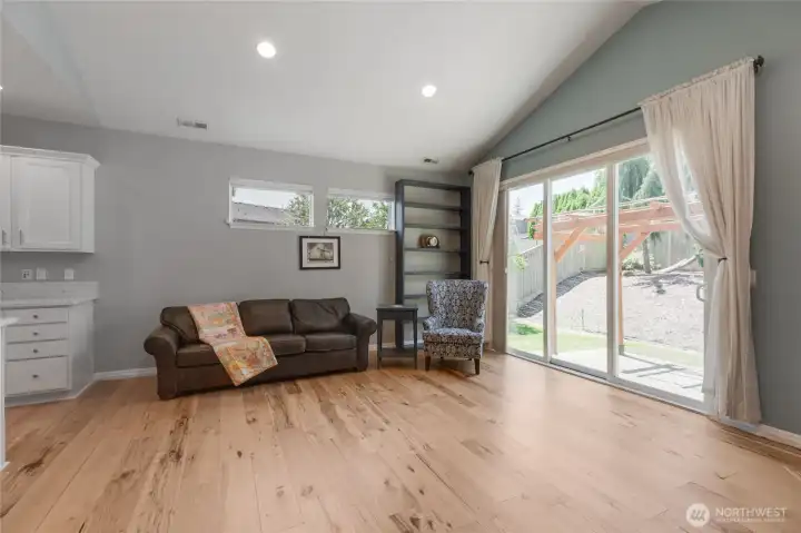 This home has the ideal East/West exposure which provides wonderful natural light in the afternoon.  The wonderful vaulted ceilings also add to the effect!