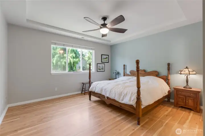 The main floor primary bedroom has great separation of space from the rest of the home.  You will love the privacy!