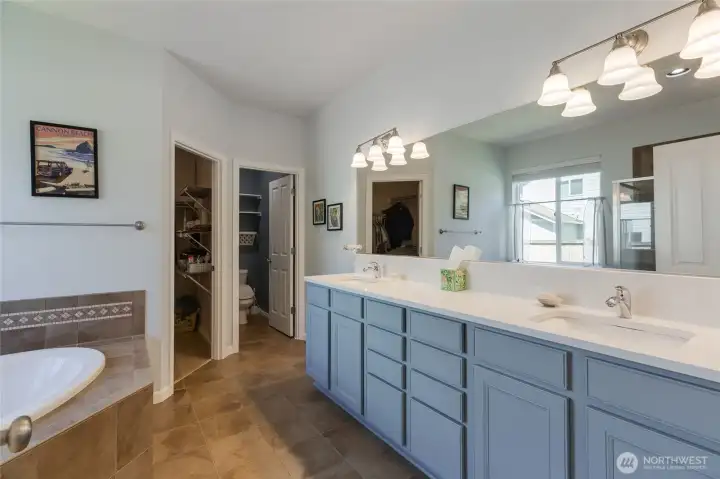 The 5-piece primary bathroom has everything you are looking for and tons of room to share.  Not pictured here is the massive walk-in closet, you can never have too much storage space!