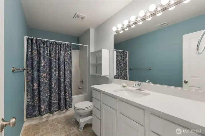 Here is the full bathroom that is adjacent to the secondary bedrooms.