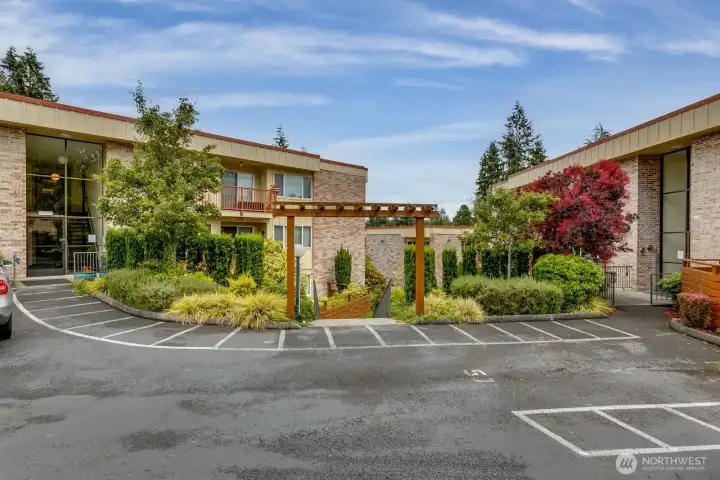 The entry to your building is ground level and there are no stairs to get to the unit. The pool is through the arbor and down to the right away from this unit. The entry to your building is ground level and there are no stairs to get to the unit. The pool is through the arbor and down to the right away from this unit.
