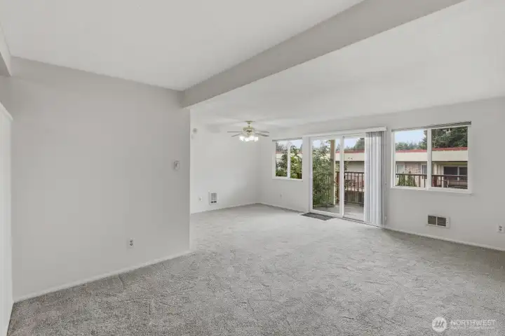 The living and dining rooms as you enter the unit. Freshly painted and new floor coverings installed. The living and dining rooms as you enter the unit. Freshly painted and new floor coverings installed.