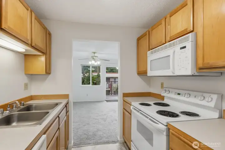 Open to the dining room you are not cut off from the action. Open to the dining room you are not cut off from the action.