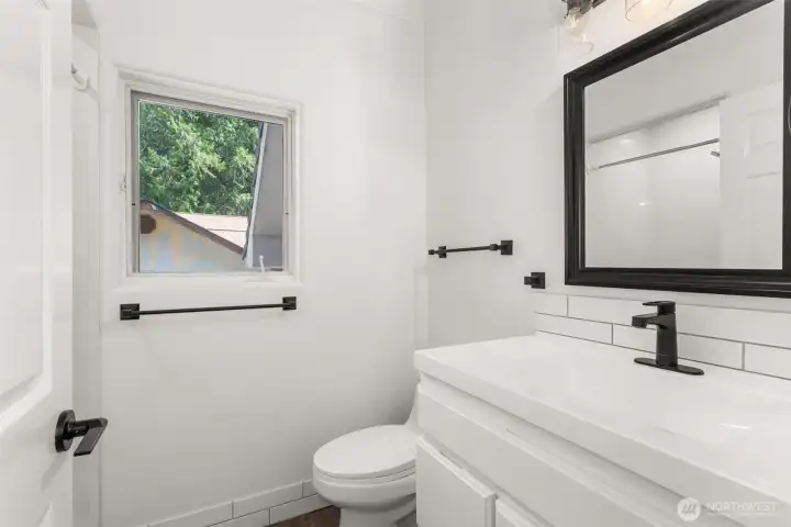 En suite to main floor bedroom. En suite to main floor bedroom.