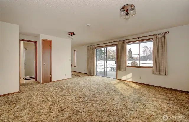 upstairs living room walking out to deck
