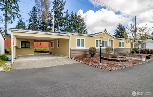 This home boasts ample parking and large attached carport!