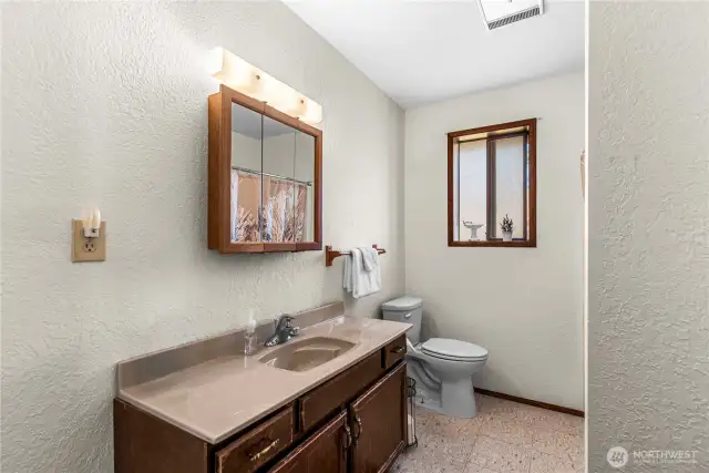 Upper bathroom with tub and shower