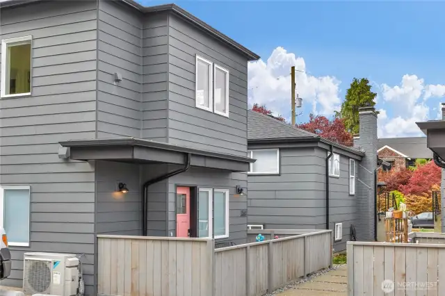 Fully fenced yard with access gate from the parking stall to the backyard