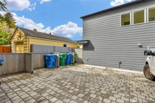 Deeded parking stall on the far left next to the backyard gate to your home.
