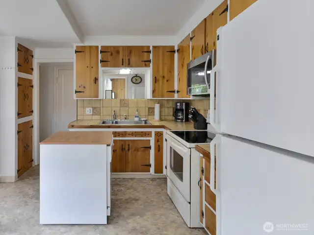 All appliances stay.  Kitchen is the hub of the house.