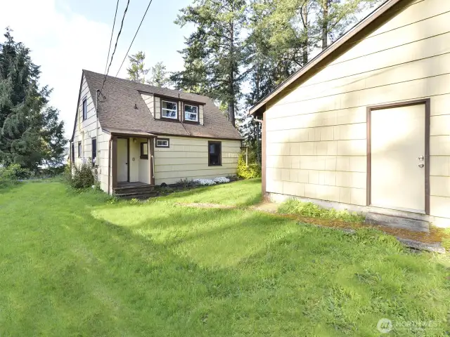 917 back yard has green belt for privacy from street and fence