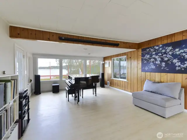 Looks out onto the deck and lake