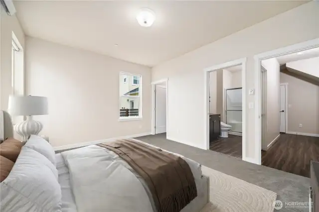 There is a walk-in closet and the primary bedroom shares the 3/4 bath with its own private door.