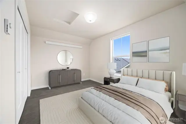 The east facing bedroom has beautiful views and takes in the sunrises.