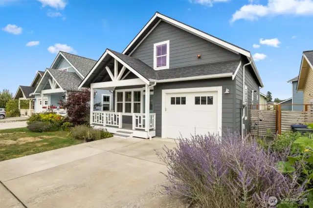 The single-car garage has additional parking on the driveway and enough room to still allow a vehicle to park inside.