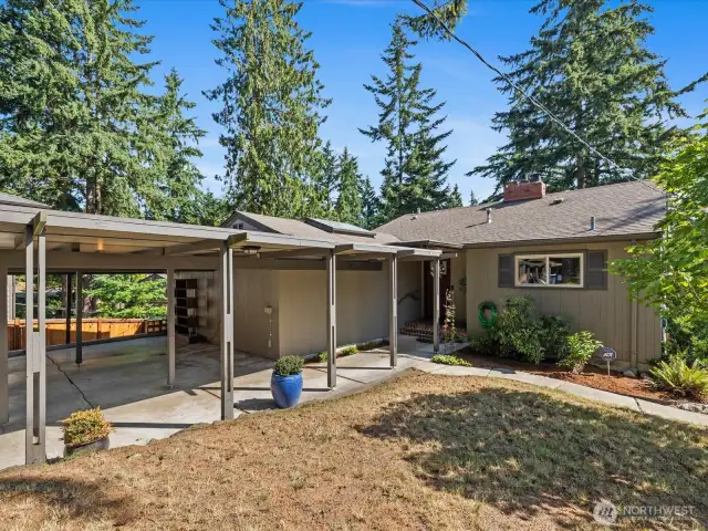 Covered carport and walkway to home.