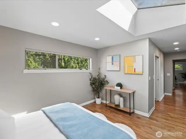 Primary bedroom with hallway to walk in closet