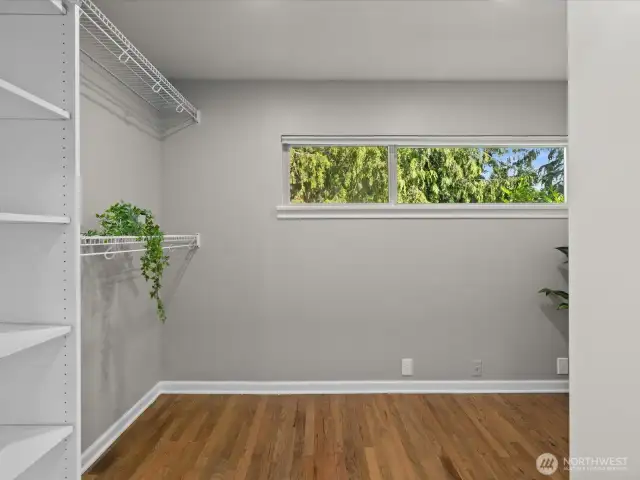 Enormous primary bedroom walk in closet