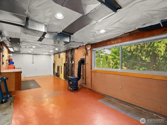 Lower level workshop space with natural gas heat stove