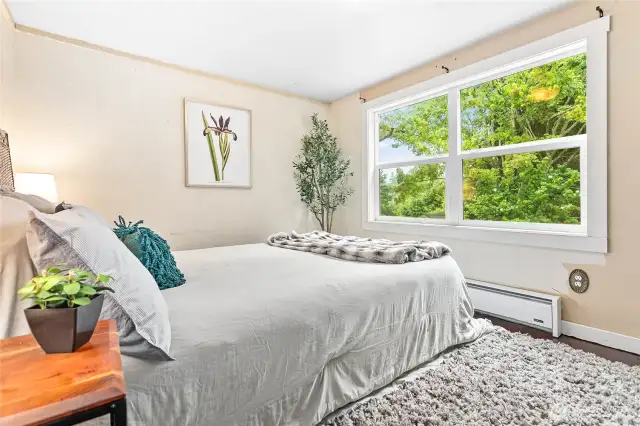 Bedroom overlooking backyard