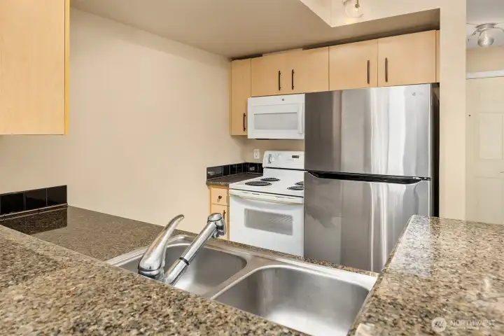 Kitchen with granite counter