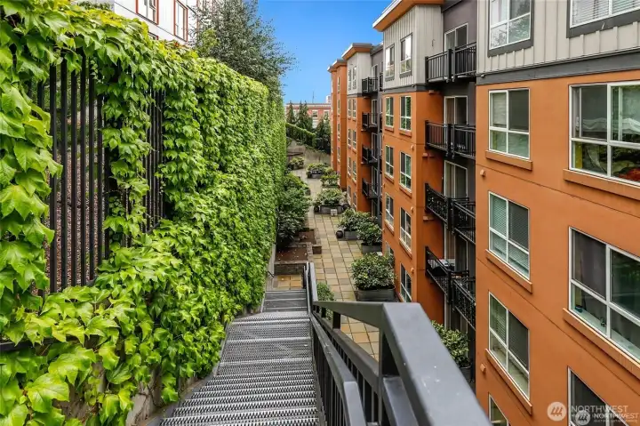 Back stairs go to Yesler with a secure gate only for residents.