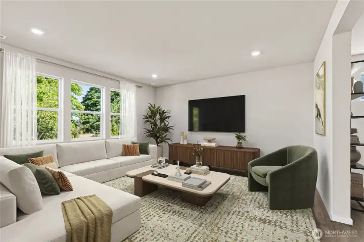 Great room area with large windows for natural light. Photo is representational. Actual home is under construction. Colors, materials, and features may vary. See site agent for details.