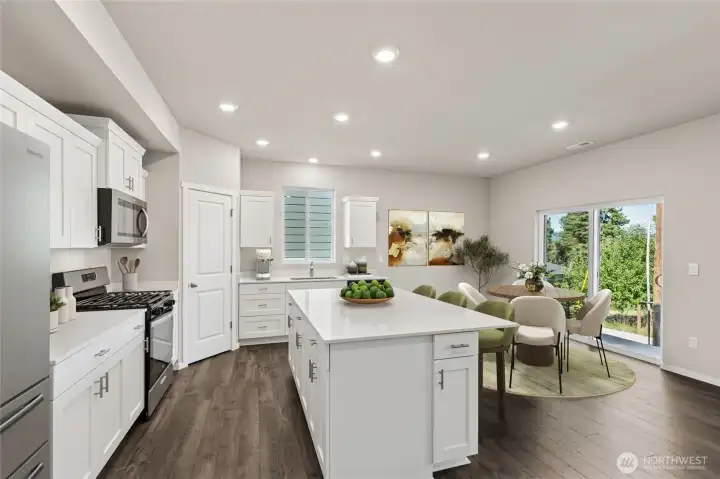 Stainless-steel appliances and shaker style cabinets with soft close doors. Photo is representational. Actual home is under construction. Colors, materials, and features may vary. See site agent for details.
