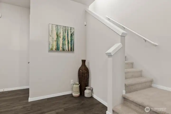 Foyer at entrance of the home. Photo is representational. Actual home is under construction. Colors, materials, and features may vary. See site agent for details.
