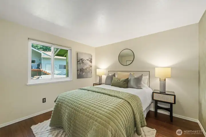 The first of two generous bedrooms on this level for a total of three.