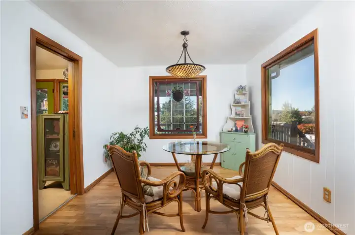 The kitchen, to the left, has pocket doors- how do you entertain?  Making magic with your team of elves sequestered in the kitchen?  Close the doors.  Love to be in the midst of it all?  Keep the door open and let the energy flow.