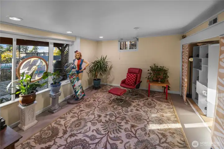 On the lower level you will find the 3rd bedroom.  An almost full wall of windows lets the natural light shine in.