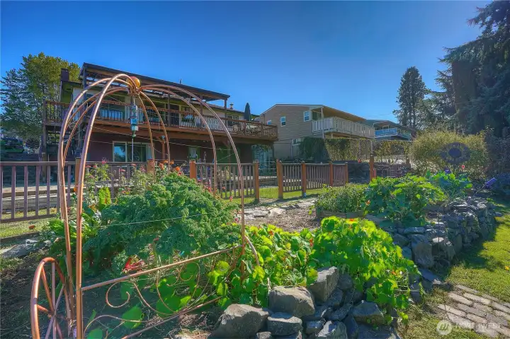 I can almost see the fairies- this home is just fun.