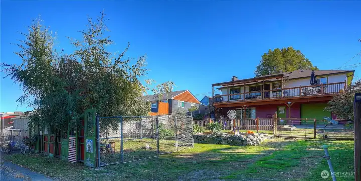 The lower fenced area is the hen house.  Tons of off street parking available, as well as a one car garage.