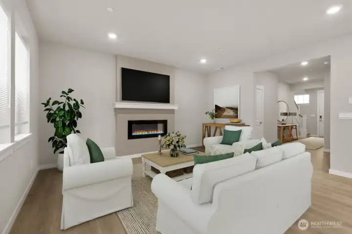 Another view of the family room. Photo is representational. Actual home is under construction and materials, colors, and finishes will vary. See site agent for details.