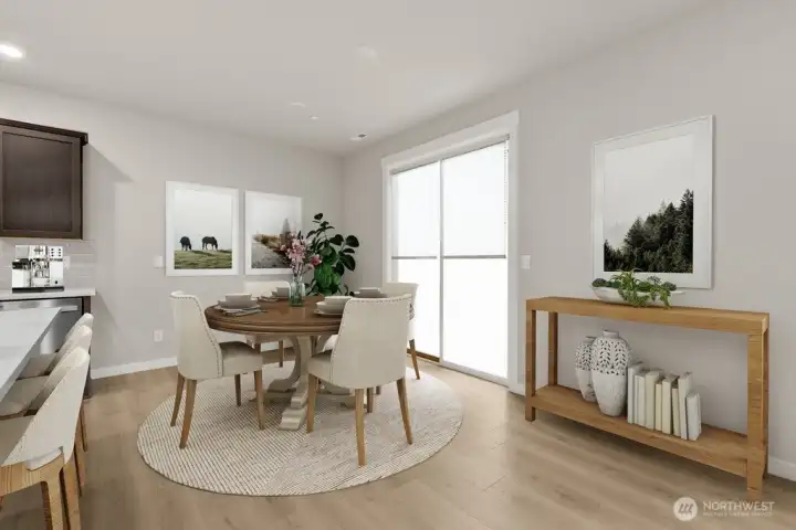 Open dining area off the kitchen.  Photo is representational. Actual home is under construction and materials, colors, and finishes will vary. See site agent for details.