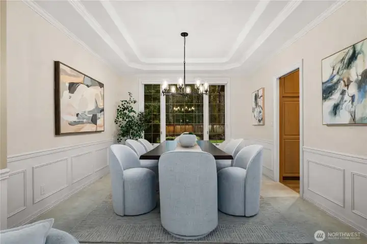 Formal dining room overlooking the park-like, fully fenced backyard