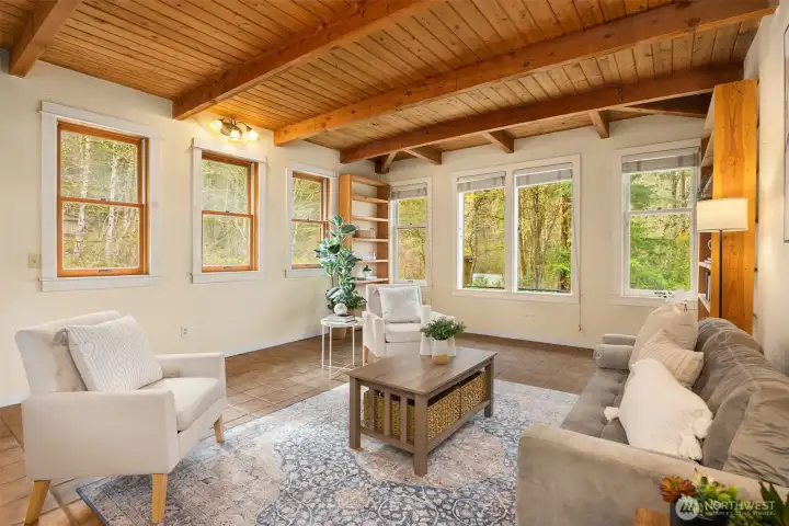 Thoughtfully designed with wood car decking ceilings and exposed beams.